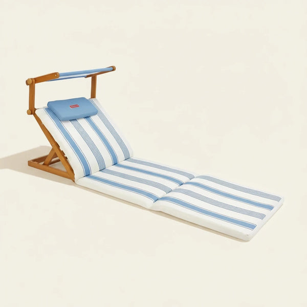 Wooden lounge chair with striped cushion on a beige background