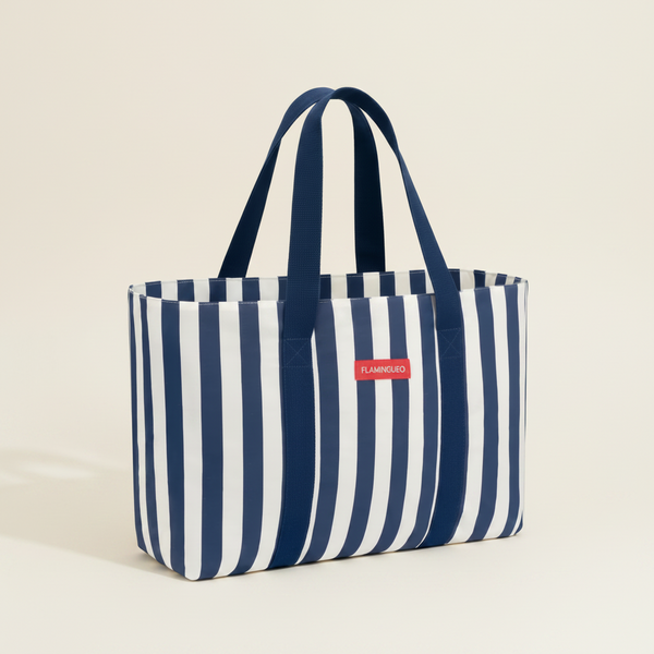 Navy and white striped tote bag with a red label on a light gray background